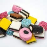 pile of sweets on white surface